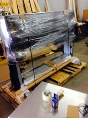 Laminator Pallet strapped to ship